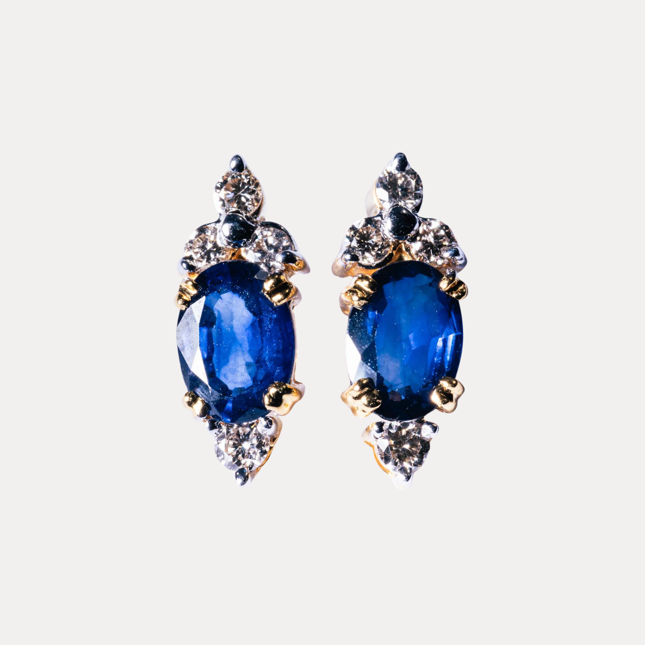 Blue Sapphire & 4 Diamond Earrings set in 18kt Gold