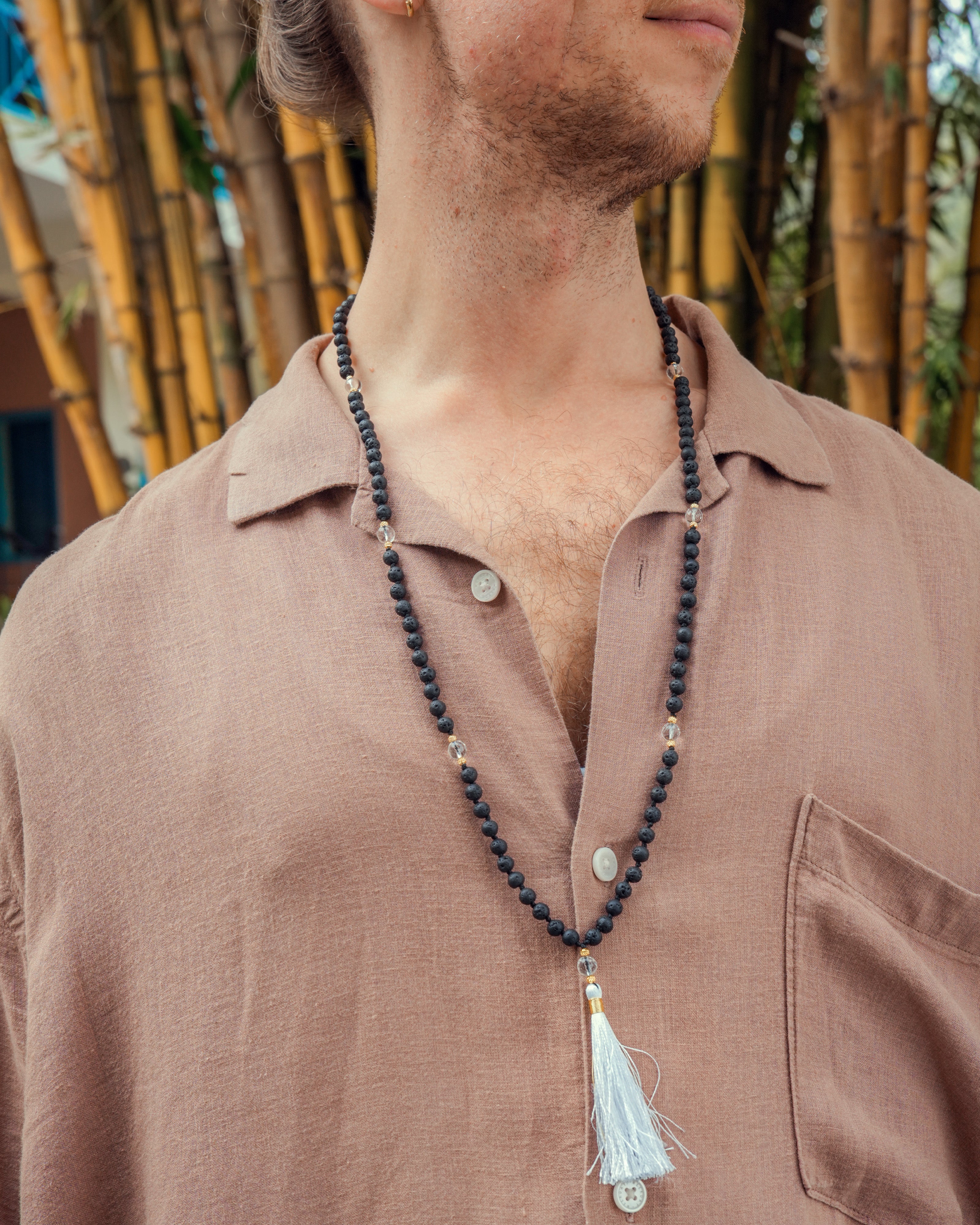 Lavastone mala with Crystal Quartz counter beads