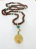 Indonesian Rudraksha Mala with 14kt Gold Sri Yantra Pendant and Emerald Counterbeads