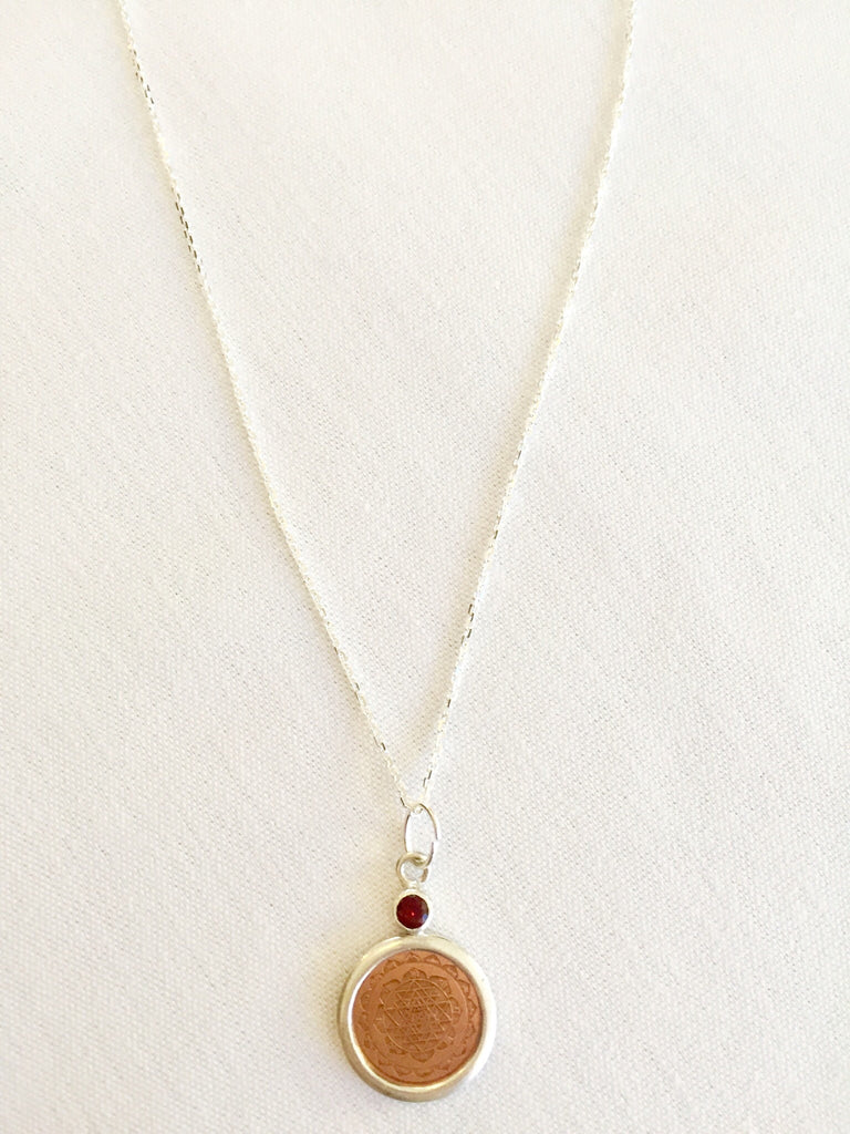 Sterling Silver Sri Yantra Pendant mounted in faceted garnet in 18" chain - The Sattva Collection